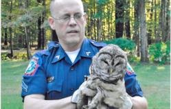 Jason Fiske with Barred Owl